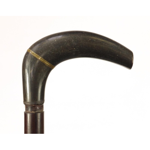 142 - Horn handled walking stick with hardwood shaft, possibly rhinoceros horn, 86cm in length