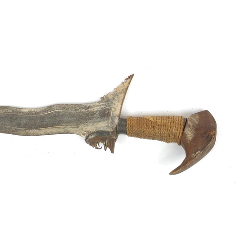 334 - Philippines silver mounted Moro Kris with steel blade, 66cm in length