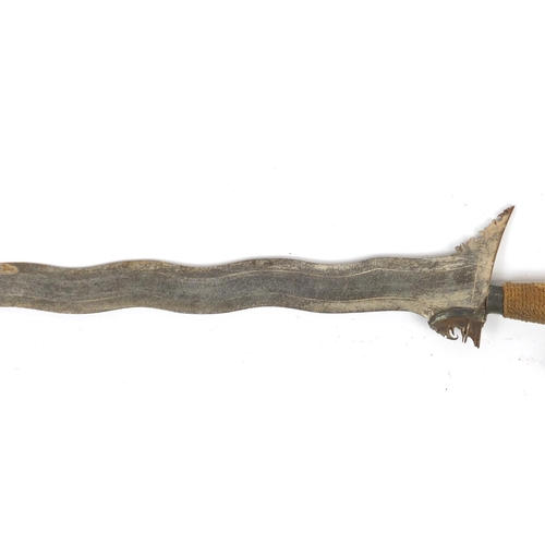 334 - Philippines silver mounted Moro Kris with steel blade, 66cm in length