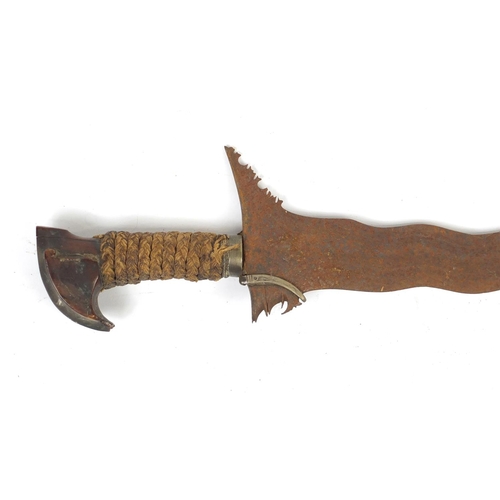 336 - Philippines silver mounted Moro Kris with steel blade, 63.5cm in length