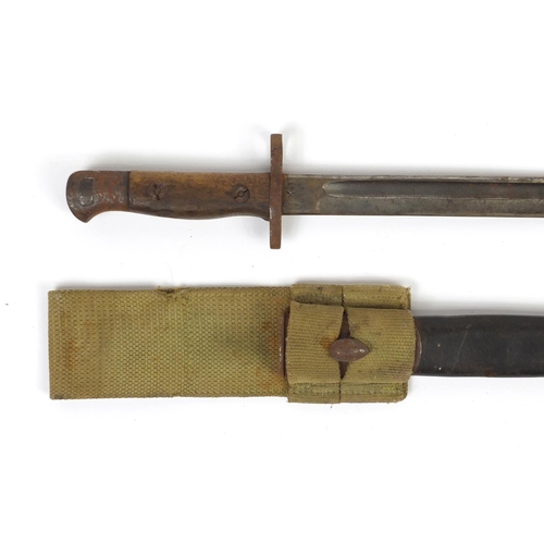 324 - British Military 1907 pattern bayonet with scabbard by Wilkinson, 57.5cm in length