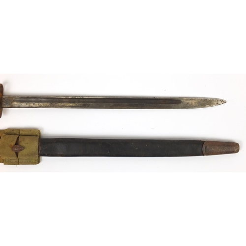 324 - British Military 1907 pattern bayonet with scabbard by Wilkinson, 57.5cm in length