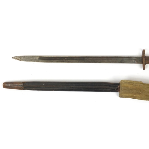 324 - British Military 1907 pattern bayonet with scabbard by Wilkinson, 57.5cm in length