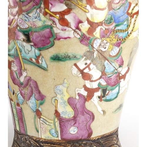 407 - Pair of Chinese crackle glazed vases with twin handles, each finely hand painted in the famille rose... 