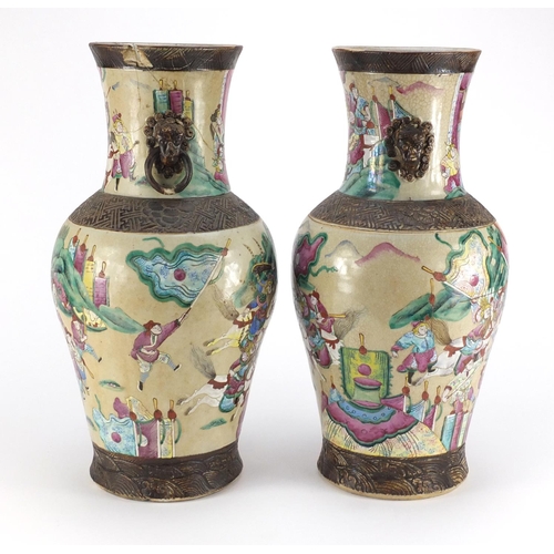 407 - Pair of Chinese crackle glazed vases with twin handles, each finely hand painted in the famille rose... 