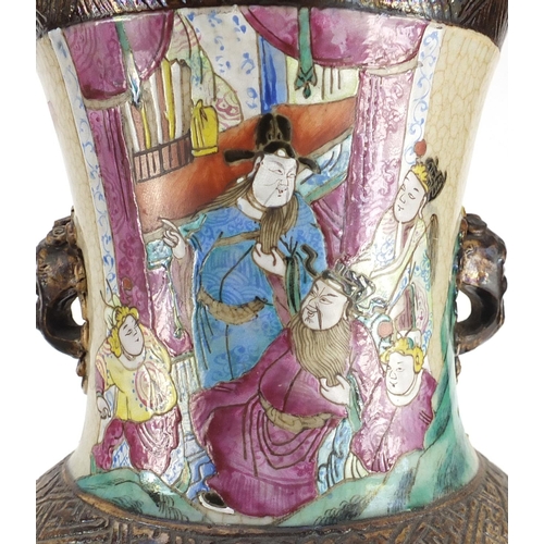 407 - Pair of Chinese crackle glazed vases with twin handles, each finely hand painted in the famille rose... 