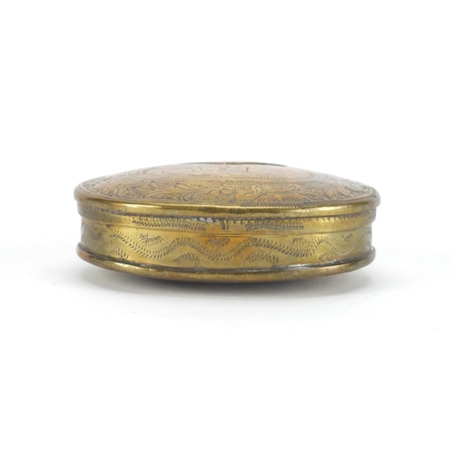 48 - Antique Dutch oval brass tobacco box, engraved with flowers, dated 1687, 8.5cm wide