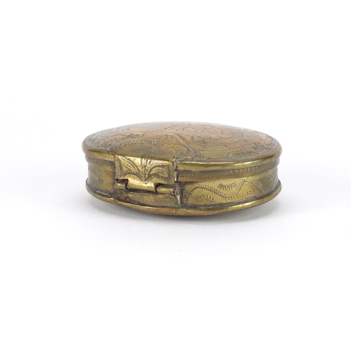 48 - Antique Dutch oval brass tobacco box, engraved with flowers, dated 1687, 8.5cm wide