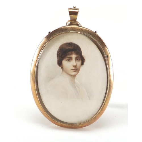 122 - Three Oval portrait miniatures including one of an Art Deco female housed in an unmarked gold pendan... 