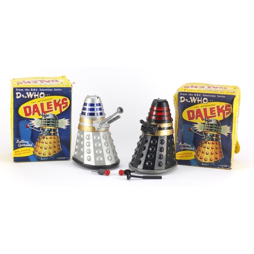 360 - Two Marx battery operated Dalek's with boxes from Dr Who comprising Black and Silver