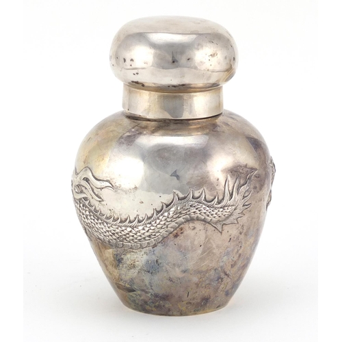 593 - Chinese silver tea caddy by Wang Hing embossed with a dragon, impressed marks to the base, 12.5cm hi... 