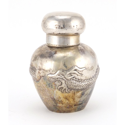 593 - Chinese silver tea caddy by Wang Hing embossed with a dragon, impressed marks to the base, 12.5cm hi... 