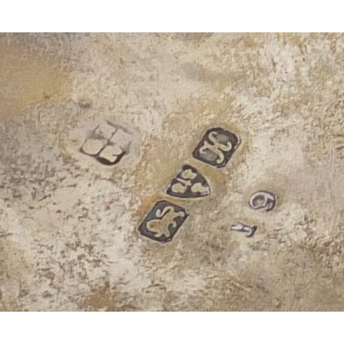 951 - Pair of Edwardian silver open salts, raised on three hoof feet, indistinct makers mark Chester 1910,... 