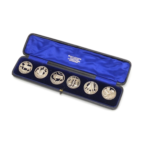 938 - Set of six Victorian Scottish silver buttons housed in a Mackay & Chisholm fitted case, embossed and... 