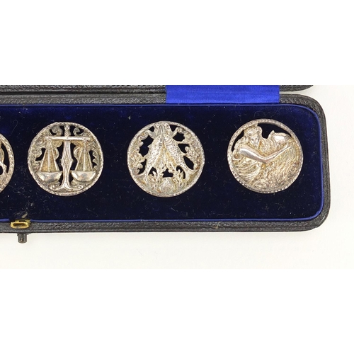 938 - Set of six Victorian Scottish silver buttons housed in a Mackay & Chisholm fitted case, embossed and... 