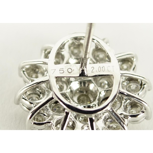 981 - Pair of 18ct white gold diamond cluster earrings, approximately 2ct in total, 2cm in diameter, 12.0g