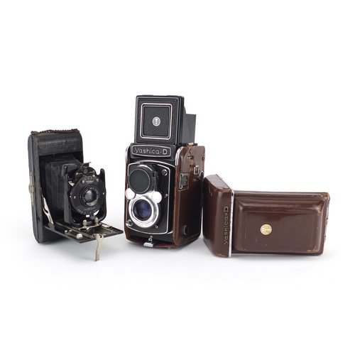 97 - Two vintage camera's comprising a Yashica-D and Ensign No4 carbine