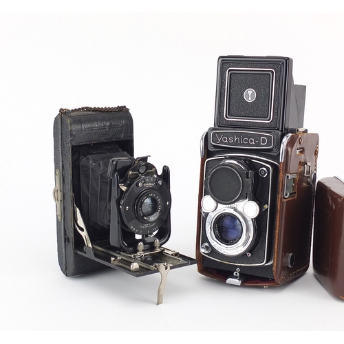 97 - Two vintage camera's comprising a Yashica-D and Ensign No4 carbine
