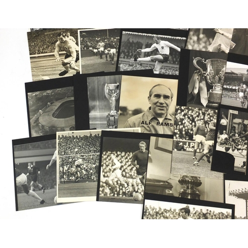 187 - Collection of 1960/70's football press photographs, mostly backed onto card including the 1966 World... 