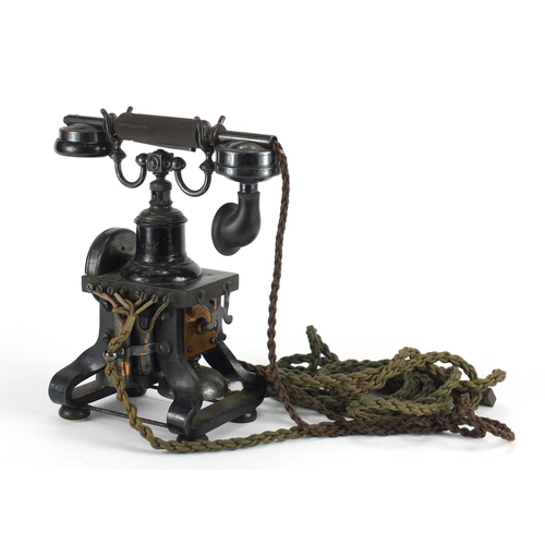 68 - 19th century Skeleton telephone by Ericsson, the cast iron phone with hand wind mechanism and two be... 