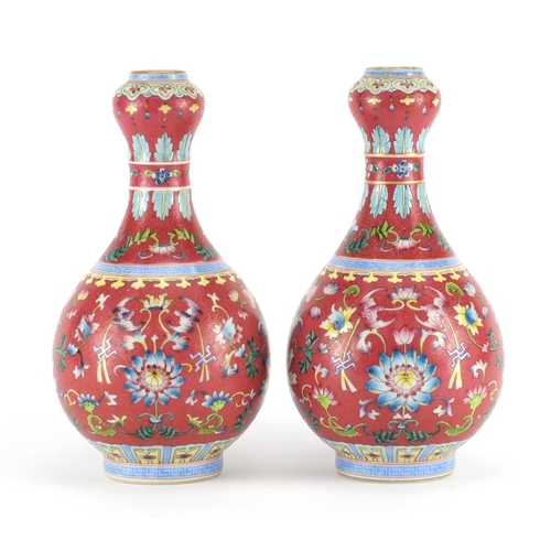 401 - Pair of Chinese porcelain garlic neck vases, each finely hand painted in the famille rose palette wi... 