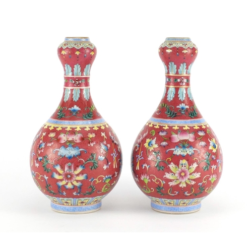 401 - Pair of Chinese porcelain garlic neck vases, each finely hand painted in the famille rose palette wi... 