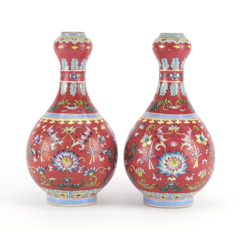 401 - Pair of Chinese porcelain garlic neck vases, each finely hand painted in the famille rose palette wi... 