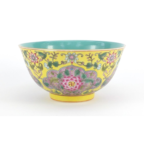 396 - Chinese porcelain yellow ground bowl, finely hand painted in the famille rose palette with chrysanth... 