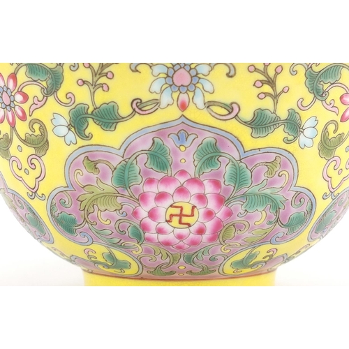 396 - Chinese porcelain yellow ground bowl, finely hand painted in the famille rose palette with chrysanth... 