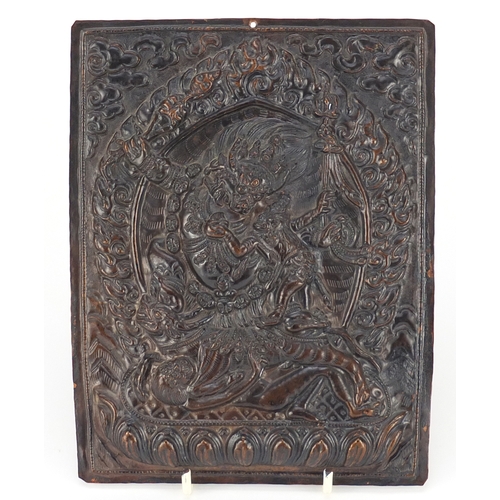 693 - ***WITHDRAWN FROM SALE ****19th century Tibetan bronzed copper plaque, embossed with mythical figure... 