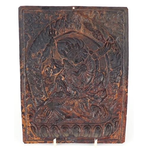 693 - ***WITHDRAWN FROM SALE ****19th century Tibetan bronzed copper plaque, embossed with mythical figure... 
