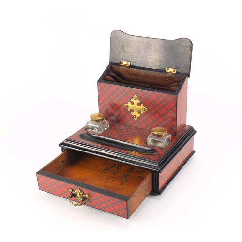 30 - Victorian Tartanware desk stand, fitted with a letter rack and a pair of glass inkwells above a base... 