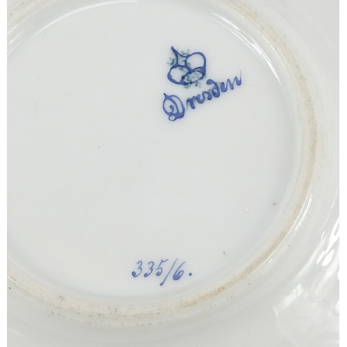 789 - Dresden porcelain hand painted with flowers, comprising a basket shaped fruit bowl, three coffee cup... 