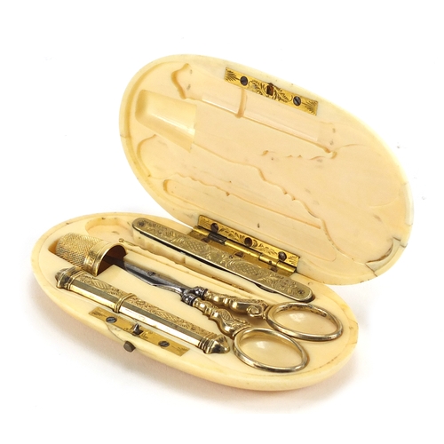 53 - 19th century French ivory necessaire housing silver gilt implements including scissors, needle case ... 