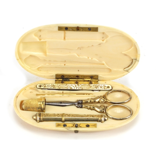 53 - 19th century French ivory necessaire housing silver gilt implements including scissors, needle case ... 