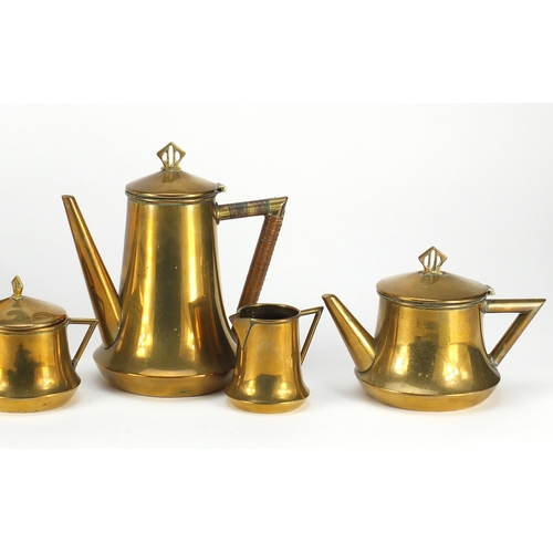 849 - Arts & Crafts brass four piece tea service on tray possibly German, the tray 37cm wide