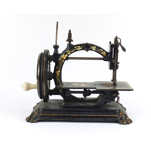 107 - Rare 19th century cast iron Todd's Champion hand operated sewing machine with paw feet, gilded with ... 