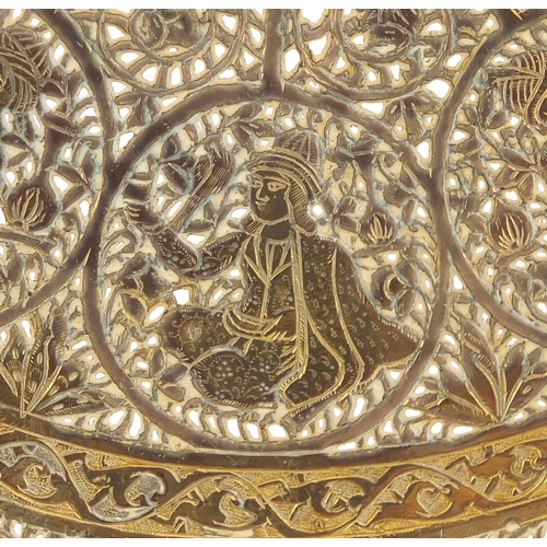 702 - Good Persian gilt copper dish, finely pierced and engraved with figures and flowers, 23cm in diamete... 