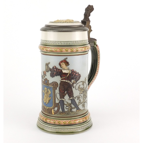 838 - Mettlach pottery stein with pewter lid, incised with two figures, incised marks to the base, 23cm hi... 