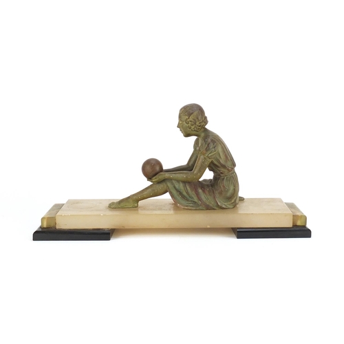 2152 - Art Deco bronzed sculpture of a female holding a ball, raised on an onyx and black slate base, 37cm ... 