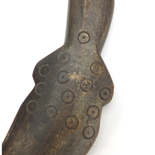 138 - Horn carving of a dagger, possibly rhinoceros horn, 31cm in length, 131.0g