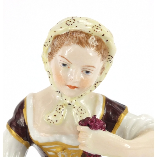 757A - 19th century Chelsea hand painted figurine of a girl holding a basket of flowers, anchor mark to the... 