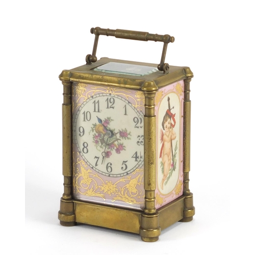 2260 - Aesthetic style brass cased carriage clock with Sèvres style panels, hand painted with putti and flo... 