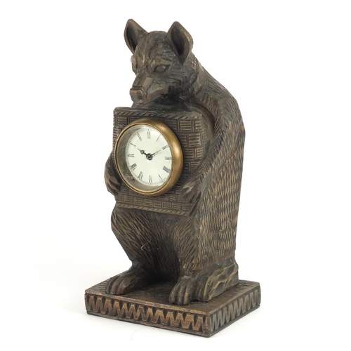 2449 - Black forest style carved wood bear design  clock, with enamelled dial and Roman numerals, 30.5cm hi... 