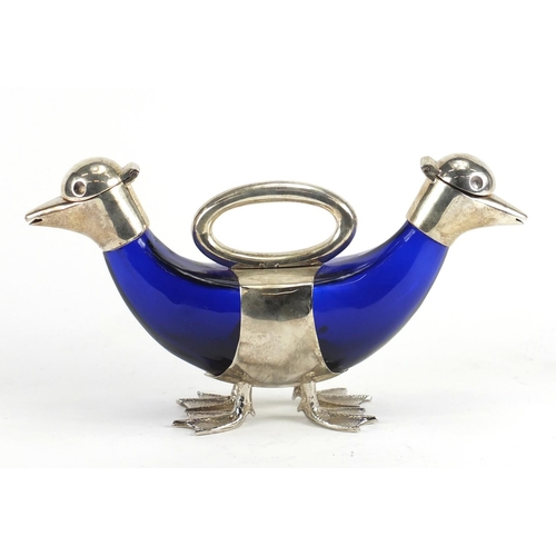 2229 - Novelty silver plated double duck decanter with blue glass body, 27cm wide
