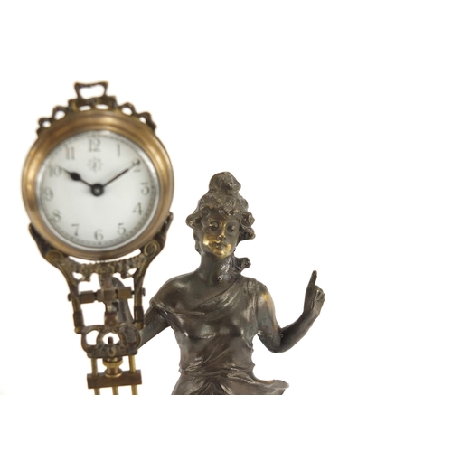 2447 - Bronze swinging clock in the form of an Art nouveau female, 34.5cm high