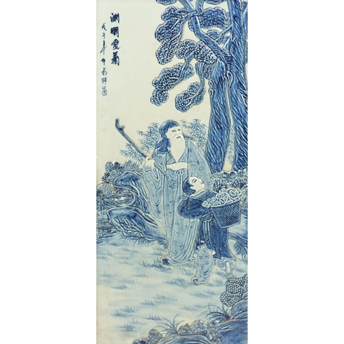 2153 - Pair of Chinese blue and white porcelain panels housed in hardwood frames, decorated in relief with ... 
