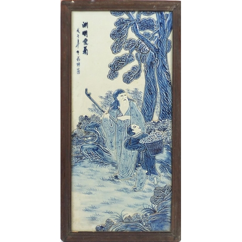 2153 - Pair of Chinese blue and white porcelain panels housed in hardwood frames, decorated in relief with ... 