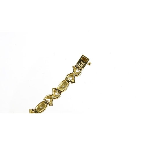 2834 - 9ct two tone gold diamond bracelet, 18cm in length, 7.4g