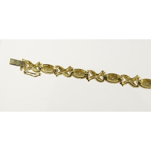 2834 - 9ct two tone gold diamond bracelet, 18cm in length, 7.4g